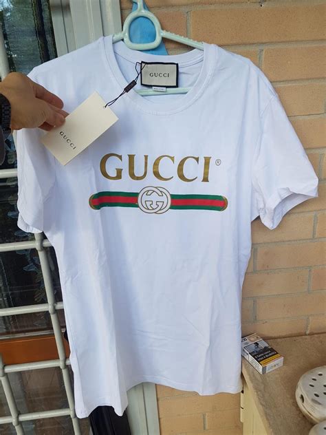 tshirt bianca con logo gucci 12 anni|T.